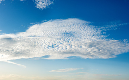 blue sky background with white cloudsの写真素材