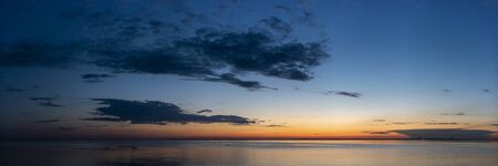 Nice panorama evening scene on lakeの写真素材