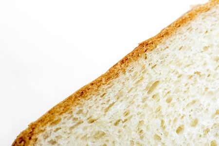 Slice of toast bread on a white background