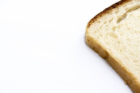 Slice of toast bread on a white background
