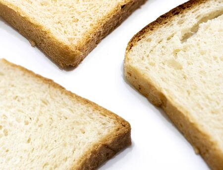 Slice of toast bread on a white background