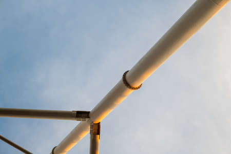 Ferris wheel support against the blue sky