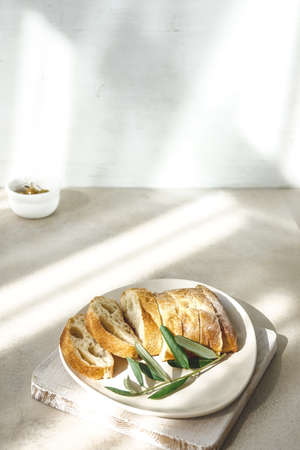 Fresh Sliced Poor Bread on Marble Table Copy Space