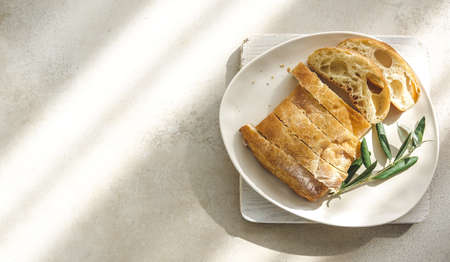 Fresh Sliced Poor Bread on Marble Table Top View Flat Lay Copy Space