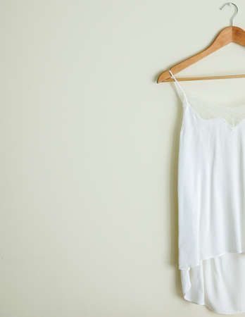 White Silk and Romantic Nightwear on Hanger Monochrome Color Minimal Designの写真素材