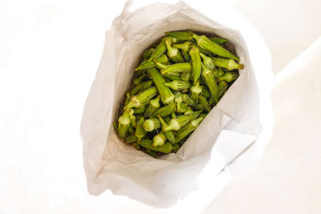 Nature Fresh Green Okra in Paper Bags Top View Close Up