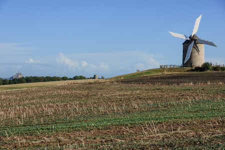 Le  de Moidre, Old windmill, and Le Mont Saint Michel monastery, Normandy, Franceの写真素材