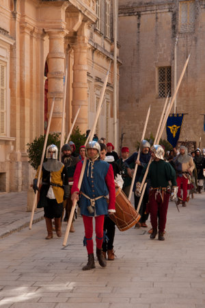 MDINA, MALTA - APRIL 14  People in medieval costume parading in the Medieval Mdina festival in...