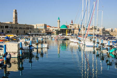 ACRE, ISR - DEC 18  Fishing boats and yachts in the fishing harbor, on Dec  18, 2013, in the old city of Acre, Israel  Acre is one of the oldest continuously inhabited sites in the world のeditorial素材