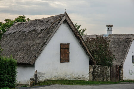 Houses with typical straw roofs, Szigliget, Hungaryの写真素材