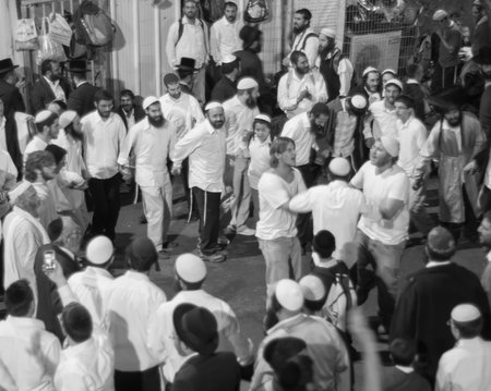 MERON, ISRAEL - MAY 18, 2014  Orthodox Jews dance at the annual hillulah of Rabbi Shimon Bar Yochai, in Meron, on Lag BaOmer Holiday  This is an annual celebration at the tomb of Rabbi Shimonのeditorial素材