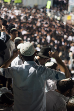 MERON, ISRAEL - MAY 18, 2014  An orthodox Jew raise his hands in dance at the annual hillulah  celebration  of Rabbi Shimon Bar Yochai, in Meron, on Lag BaOmer Holiday のeditorial素材