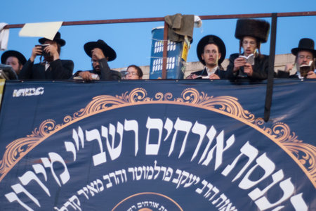 MERON, ISRAEL - MAY 18, 2014  Orthodox Jews prays a sunrise  Shacharit  pray at the annual hillulah  celebration  of Rabbi Shimon Bar Yochai, in Meron, on Lag BaOmer Holiday のeditorial素材