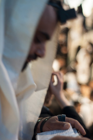 MERON, ISRAEL - MAY 18, 2014  Orthodox Jews prays a sunrise  Shacharit  pray at the annual hillulah  celebration  of Rabbi Shimon Bar Yochai, in Meron, on Lag BaOmer Holiday のeditorial素材