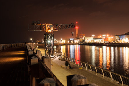 TEL-AVIV, ISRAEL - JAN 16, 2014  The reconstructed old crane, the Reading Power Station, and local shops and restaurants in Tel-Aviv harbor compoundのeditorial素材