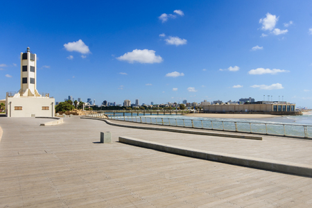 The Reading Light, or Tel Aviv Lighthouse, and the Wauchope Bridge  over the mouth of the Yarkon stream , near the Tel Aviv Port compound  Tel Aviv, Israelの写真素材