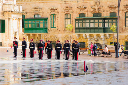 VALLETTA, MALTA - APRIL 13, 2012: Changing of the guards ceremony in the forecourt of the Presidential Palace in St. Georges Square, Valletta, Maltaのeditorial素材