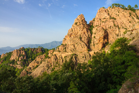 The cliffs of the Calanques de Piana at sunset, in Corsica, Franceの写真素材
