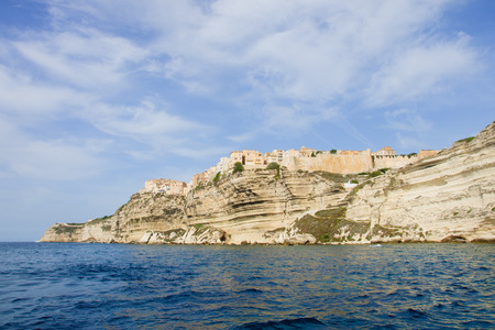 The cliffs, buildings, and city wall, in Bonifacio, Corsica, Franceの写真素材