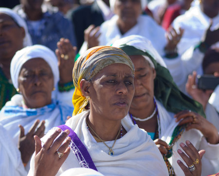 JERUSALEM - NOV 20, 2014: Ethiopian Jewish women pray at the Sigd, in Jerusalem, Israel. The Sigd is an annual holiday of the Ethiopian Jewsのeditorial素材