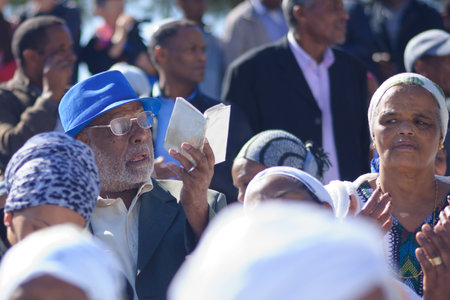 JERUSALEM - NOV 20, 2014: Ethiopian Jewish men and women pray at the Sigd, in Jerusalem, Israel. The Sigd is an annual holiday of the Ethiopian Jewsのeditorial素材