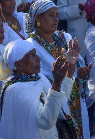 JERUSALEM - NOV 20, 2014: Ethiopian Jewish women pray at the Sigd, in Jerusalem, Israel. The Sigd is an annual holiday of the Ethiopian Jewsのeditorial素材