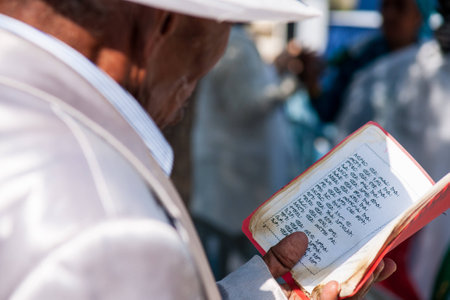 JERUSALEM - OCT 31, 2013: Ethiopian Jewish man prays at the Sigd in Jerusalem, Israel. The Sigd is an annual holiday of the Ethiopian Jews.のeditorial素材