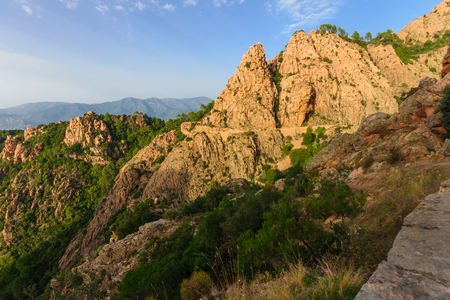 The cliffs of the Calanques de Piana at sunset, in Corsica, Franceの写真素材