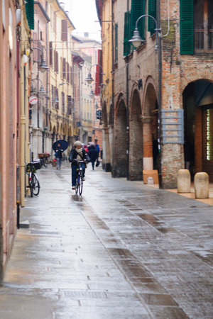 FERRARA, ITALY - JAN 20, 2015: Scene of an old city street (via san Romeo), with local and tourists, in Ferrara, Emilia-Romagna, Italyのeditorial素材