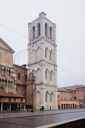 FERRARA, ITALY - JAN 20, 2015: Scene of the Piazza Trento e Trieste and the cathedral tower, with local and tourists, in Ferrara, Emilia-Romagna, Italyのeditorial素材