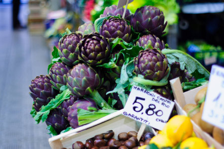 Artichokes and other products on sale in the market, in Modena, Emilia-Romagna, Italyの写真素材