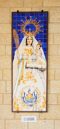 NAZARETH, ISRAEL - APR 05, 2015: A Mosaic donated by the people of San Salvador, part of a display of donations of many nations, in the Church of Annunciation, in Nazareth, Israelのeditorial素材