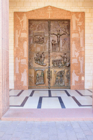 NAZARETH, ISRAEL - APR 05, 2015: A decorated wooden door in the main entrance of the Church of Annunciation, in Nazareth, Israelのeditorial素材