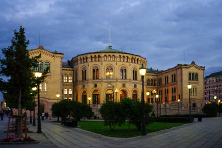 OSLO, NORWAY - SEPTEMBER 26, 2010: The Storting building, the parliament house, with local and tourists, in Oslo, Norwayのeditorial素材