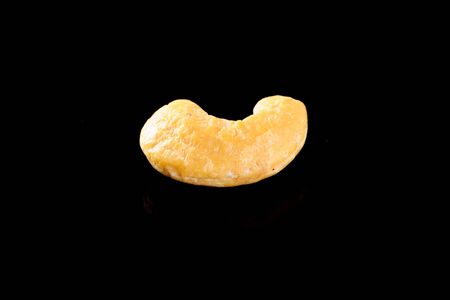 Raw Cashew Nut on a black backgroundの写真素材