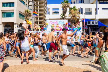 TEL AVIV ISRAEL  JUNE 12 2015: Dancers on a truck entertain the crowd in the Pride Parade in TelAviv Israel. Its part of an annual event of the LGBT communityのeditorial素材