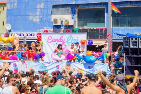 TEL AVIV ISRAEL  JUNE 12 2015: Dancers on a truck entertain the crowd in the Pride Parade in TelAviv Israel. Its part of an annual event of the LGBT communityのeditorial素材