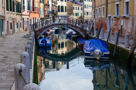 Canals, boats and bridges in Venice, Veneto, Italyの写真素材