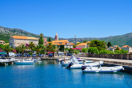 Orebic, CROATIA - JUNE 25, 2015: Scene of the port, and the town center, with locals and tourists, in Orebic, Croatiaのeditorial素材