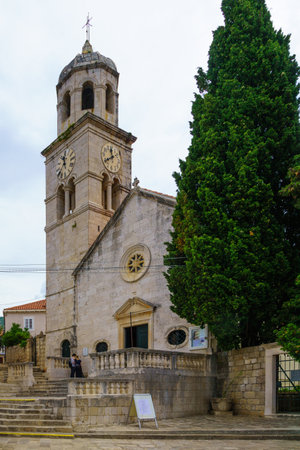 CAVTAT, CROATIA - JUNE 28, 2015: Scene of The Church of St. Nicholas, with locals and tourists, in Cavtat, Croatiaのeditorial素材