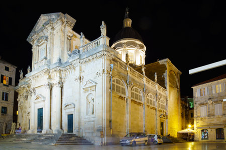 DUBROVNIK, CROATIA - JUNE 26, 2015: Night scene of the Cathedral, with locals and tourists, in Dubrovnik, Croatiaのeditorial素材