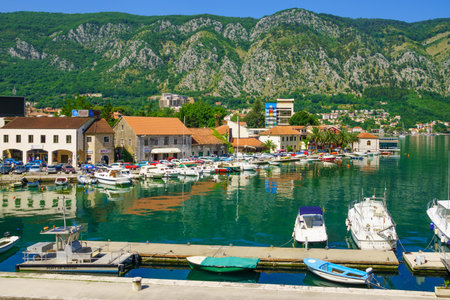KOTOR, MONTENEGRO - JUNE 29, 2015: Scene of the port and the bay, with ships and other boats, local businesses, locals and tourists, in Kotor, Montenegroのeditorial素材