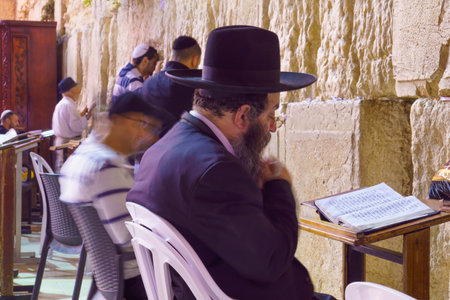 JERUSALEM, ISRAEL - SEPTEMBER 21, 2015: Jewish men pray Selichot Jewish penitential prays in the western wall, in the old city of Jerusalem, Israelのeditorial素材