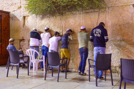 JERUSALEM, ISRAEL - SEPTEMBER 21, 2015: Jewish men pray Selichot Jewish penitential prays in the western wall, in the old city of Jerusalem, Israelのeditorial素材