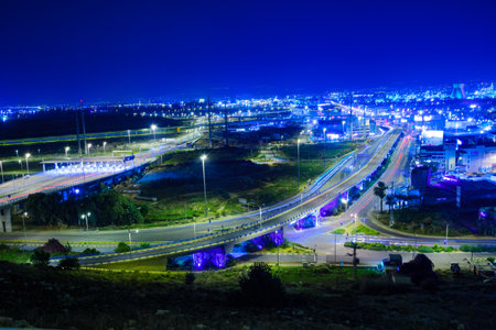 HAIFA, ISRAEL - NOVEMBER 05, 2015: Night view of the bay commercial area, with the refineries and local businesses, in Haifa, Israelのeditorial素材