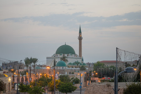 ACRE, ISRAEL - OCTOBER 18, 2015: A business street and the Ahmed el-Jazzar Mosque, in the old city of Acre, Israel. Acre is one of the oldest continuously inhabited sites in the world.のeditorial素材