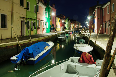 Canals, boats and colorful houses at in Burano, Venice, Veneto, Italyの写真素材