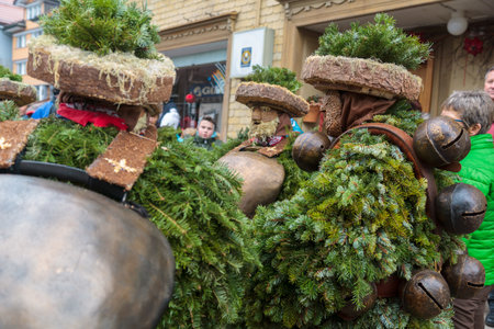 URNASCH, SWITZERLAND - DECEMBER 31, 2015: New Year Mummers, and spectators in Urnasch, Appenzell, Switzerland. Its part of the Silvesterchlausen tradition of greeting for the New Yearのeditorial素材