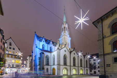 ST. GALLEN, SWITZERLAND - JANUARY 01, 2016: Night view of the St. Laurenzen Kirche St. Lawrence Church, with Christmas decoration, in St. Gallen, Switzerlandのeditorial素材