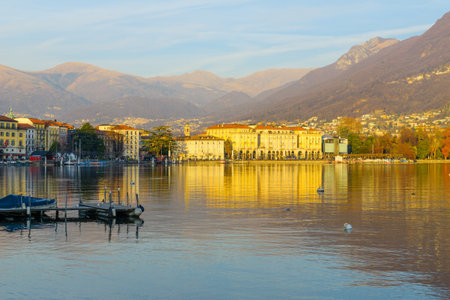 LUGANO, SWITZERLAND - DECEMBER 29, 2015: View of the lakeside promenade, with locals and visitors, in Lugano, Ticino, Switzerlandのeditorial素材